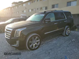 2016 Cadillac Escalade Premium Collection z VIN 1GYS4CKJ6GR409219, wystawiony jako Copart lot #49927705 z przebiegiem 56 962 mil mil oraz Czysty tytuł • Clean title. Historia ofert i sprzedaży dostępna na DreamBid. Obrazek 1.
