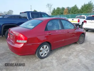 2009 Kia Spectra EX with VIN KNAFE221095634712, listed as a IAAI auction lot 41930897 with 165,185 mi miles. Bid and sale history available at carsss.com. Image 4.