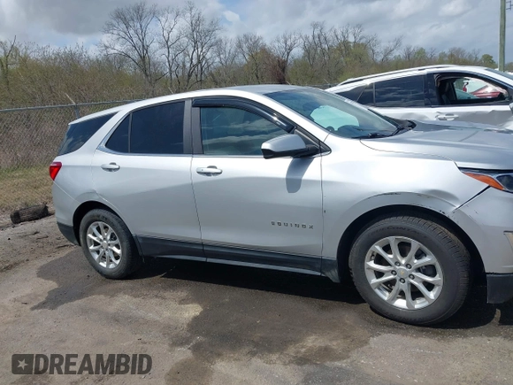 2021 Chevrolet Equinox LT with VIN 2GNAXKEV3M6129404, listed as a IAAI auction lot 41779923 with 113,615 mi miles and . Bid and sale history available at DreamBid. Image 13.
