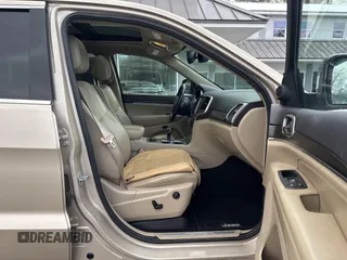 2014 Jeep Grand Cherokee Limited z VIN 1C4RJFBM2EC315721, wystawiony jako IAAI lot #41512041 z przebiegiem 180 972 mil mil oraz . Historia ofert i sprzedaży dostępna na DreamBid. Obrazek 5.