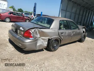 2003 Ford Crown Victoria LX z VIN 2FAFP74W33X141881, wystawiony jako Copart lot #54204695 z przebiegiem 98 466 mil mil oraz Szkoda całkowita • Salvage title. Historia ofert i sprzedaży dostępna na DreamBid. Obrazek 3.