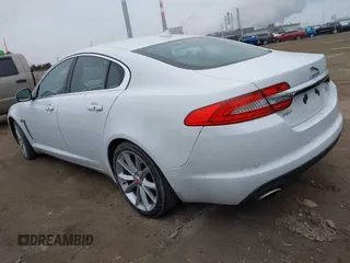 2015 Jaguar XF V6 Portfolio with VIN SAJWJ0FF2F8U59934, listed as a IAAI auction lot 41558305 with 120,219 mi miles. Bid and sale history available at carsss.com. Image 3.