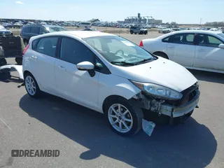 2016 Ford Fiesta SE with VIN 3FADP4EJ6GM170303, listed as a IAAI auction lot 42045585 with 121,162 mi miles. Bid and sale history available at carsss.com. Image 1.