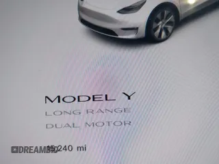 2023 Tesla Model Y Long Range with VIN 7SAYGDEE9PA094191, listed as a IAAI auction lot 41906319 with 15,240 mi miles and . Bid and sale history available at DreamBid. Image 16.