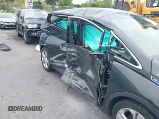 2018 Chevrolet Bolt EV LT z VIN 1G1FW6S02J4133385, wystawiony jako IAAI lot #42380348 z przebiegiem 87 041 mil mil oraz . Historia ofert i sprzedaży dostępna na DreamBid. Obrazek 6.