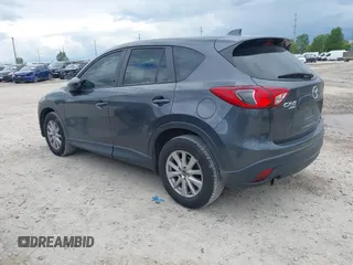 2014 Mazda CX-5 Sport z VIN JM3KE4BE6E0404753, wystawiony jako IAAI lot #42260554 z przebiegiem 144 688 mil mil oraz . Historia ofert i sprzedaży dostępna na DreamBid. Obrazek 3.