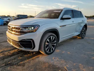 2023 Volkswagen Atlas SEL Premium R-Line z VIN 1V2FE2CA9PC228100, wystawiony jako Copart lot #42774795 z przebiegiem 6 944 mil mil oraz Szkoda całkowita • Salvage title. Historia ofert i sprzedaży dostępna na DreamBid. Obrazek 1.