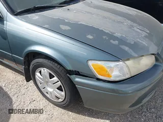 2001 Toyota Camry CE z VIN JT2BG22K310536515, wystawiony jako IAAI lot #42409847 z przebiegiem 205 978 mil mil oraz . Historia ofert i sprzedaży dostępna na DreamBid. Obrazek 12.