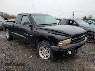 2001 Dodge Dakota Sport z VIN 1B7GL22N31S137577, wystawiony jako Copart lot #50119405 z przebiegiem Nie podano mil oraz Czysty tytuł • Clean title. Historia ofert i sprzedaży dostępna na DreamBid. Obrazek 4.