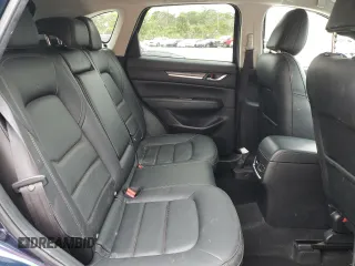 2021 Mazda CX-5 Grand Touring with VIN JM3KFADM9M0401778, listed as a Copart auction lot 46227515 with 44,587 mi miles and Non Repairable. Bid and sale history available at carsss.com. Image 11.