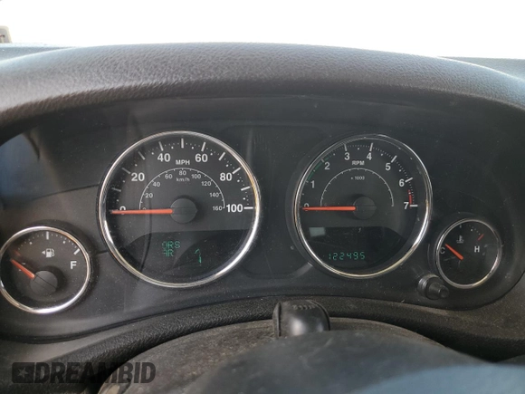 2014 Jeep Wrangler Unlimited Sahara with VIN 1C4BJWEG1EL210949, listed as a Copart auction lot 60977555 with 122,495 mi miles and Salvage title. Bid and sale history available at DreamBid. Image 9.