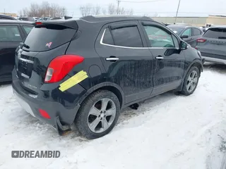 2014 Buick Encore with VIN KL4CJASB5EB583363, listed as a IAAI auction lot 41620964 with 98,930 mi miles. Bid and sale history available at carsss.com. Image 4.