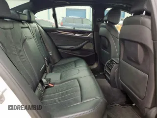 2018 BMW 5 Series 540i с VIN WBAJE5C58JG917669, выставлен на аукционе Copart как лот 57396815 с пробегом 117 967 миль миль и Списание • Salvage title. История ставок и продаж доступна на DreamBid. Изображение 10.
