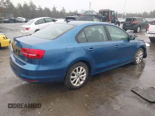 2015 Volkswagen Jetta Sedan 1.8T SE with VIN 3VWD17AJ7FM233634, listed as a IAAI auction lot 41942329 with 128,996 mi miles. Bid and sale history available at carsss.com. Image 4.