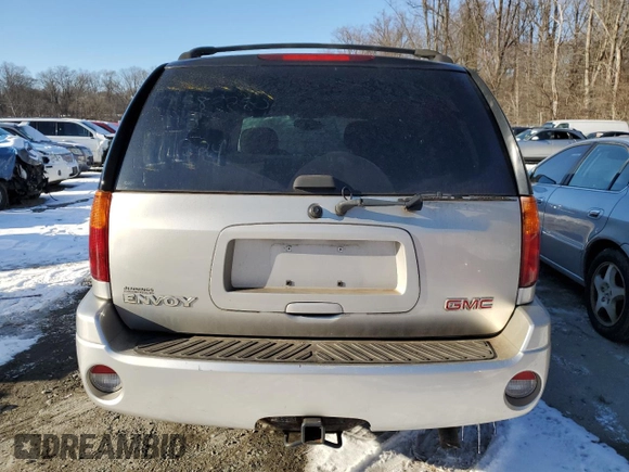 2005 GMC Envoy SLE with VIN 1GKDT13S952144044, listed as a Copart auction lot 88269485 with 0 mi miles and Salvage Title. Bid and sale history available at carsss.com. Image 6.