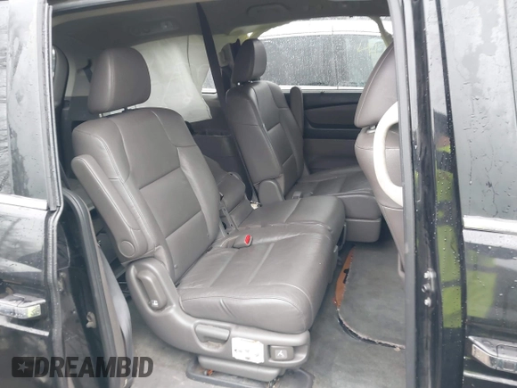 2016 Honda Odyssey EX-L with VIN 5FNRL5H65GB093937, listed as a IAAI auction lot 41691669 with 264,960 mi miles and . Bid and sale history available at DreamBid. Image 8.