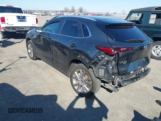 2022 Mazda CX-30 S Select with VIN 3MVDMBBL2NM442323, listed as a IAAI auction lot 41765707 with 40,848 mi miles and . Bid and sale history available at DreamBid. Image 3.