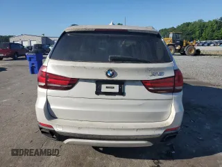 2014 BMW X5 xDrive50i z VIN 5UXKR6C57E0C03114, wystawiony jako Copart lot #57940175 z przebiegiem 165 249 mil mil oraz Czysty tytuł • Clean title. Historia ofert i sprzedaży dostępna na DreamBid. Obrazek 6.