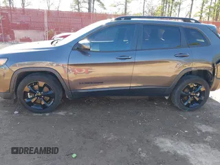 2020 Jeep Cherokee Latitude Plus with VIN 1C4PJLLB0LD648493, listed as a IAAI auction lot 41224900 with 70,995 mi miles. Bid and sale history available at carsss.com. Image 14.
