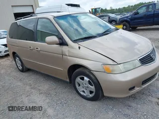 2001 Honda Odyssey EX z VIN 2HKRL18631H601677, wystawiony jako IAAI lot #42270829 z przebiegiem 205 706 mil mil oraz . Historia ofert i sprzedaży dostępna na DreamBid. Obrazek 1.