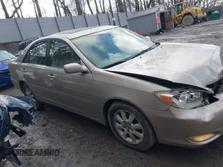 2003 Toyota Camry LE with VIN 4T1BE30K13U705105, listed as a IAAI auction lot 41696395 with 191,389 mi miles and . Bid and sale history available at DreamBid. Image 13.