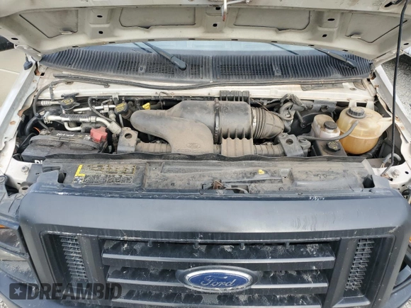 2010 Ford Econoline Passenger XL with VIN 1FMNE1BWXADA30935, listed as a Copart auction lot 77912734 with 153,775 mi miles and Salvage Title. Bid and sale history available at DreamBid. Image 11.