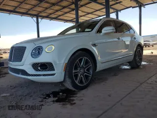 2018 Bentley Bentayga Signature z VIN SJAAC2ZVXJC020084, wystawiony jako Copart lot #79281234 z przebiegiem 38 181 mil mil oraz Szkody całkowita. Historia ofert i sprzedaży dostępna na DreamBid. Obrazek 1.
