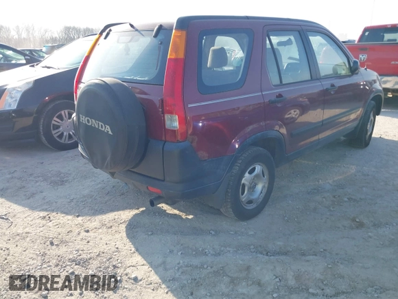 2003 Honda CR-V LX with VIN JHLRD68523C016012, listed as a IAAI auction lot 41797215 with 219,821 mi miles and . Bid and sale history available at DreamBid. Image 4.