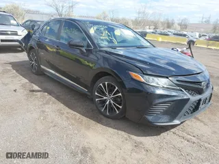 2018 Toyota Camry LE with VIN 4T1B11HK5JU076028, listed as a IAAI auction lot 41989266 with 215,235 mi miles. Bid and sale history available at carsss.com. Image 1.