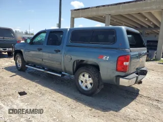 2013 Chevrolet Silverado 1500 LT with VIN 3GCPKSE77DG172991, listed as a Copart auction lot 56034805 with 155,839 mi miles and Salvage Title. Bid and sale history available at DreamBid. Image 2.