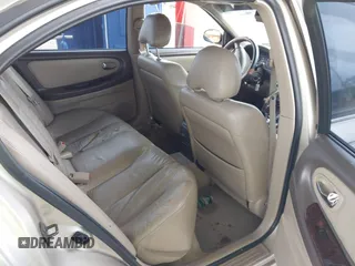 2000 Nissan Maxima GXE z VIN JN1CA31D8YT744603, wystawiony jako IAAI lot #42435490 z przebiegiem Nie podano mil oraz . Historia ofert i sprzedaży dostępna na DreamBid. Obrazek 8.