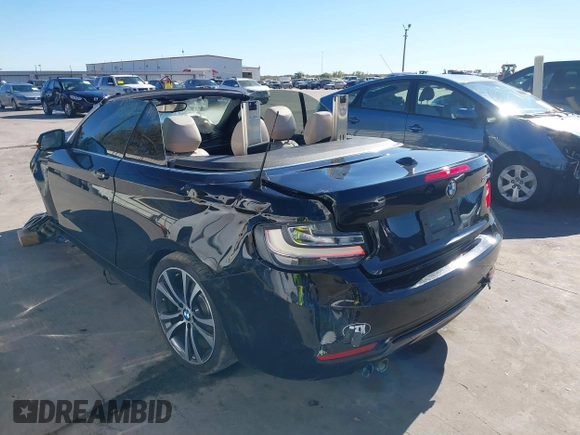 2015 BMW 2 Series 228i with VIN WBA1K5C57FV473826, listed as a IAAI auction lot 41866820 with 130,823 mi miles. Bid and sale history available at carsss.com. Image 3.