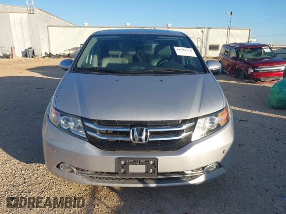 2014 Honda Odyssey Touring with VIN 5FNRL5H97EB094353, listed as a IAAI auction lot 41701712 with 141,228 mi miles and . Bid and sale history available at DreamBid. Image 13.