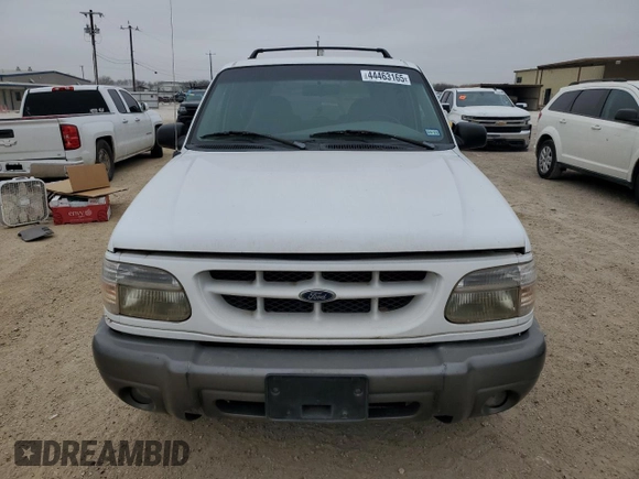 1999 Ford Explorer with VIN 1FMYU22E1XUA94061, listed as a Copart auction lot 44463165 with 172,246 mi miles and Salvage title. Bid and sale history available at DreamBid. Image 5.