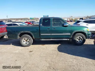 2004 Toyota Tundra SR5 with VIN 5TBRT34114S448987, listed as a IAAI auction lot 41763720 with 228,203 mi miles. Bid and sale history available at carsss.com. Image 14.
