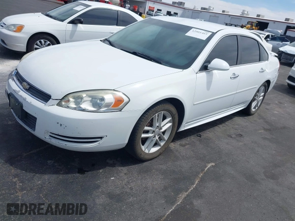 2013 Chevrolet Impala LTZ with VIN 2G1WC5E38D1258965, listed as a IAAI auction lot 42001465 with 139,929 mi miles and . Bid and sale history available at DreamBid. Image 2.