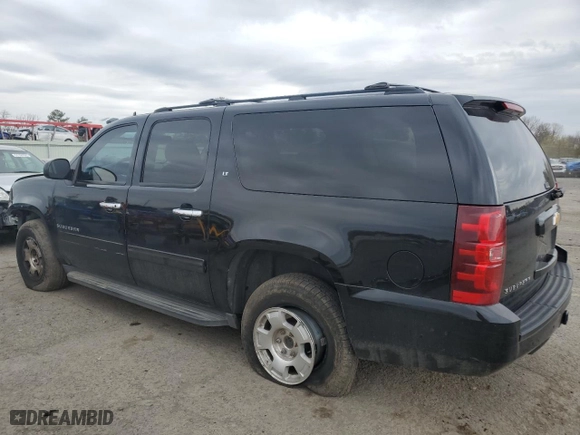 2014 Chevrolet Suburban LT with VIN 1GNSKJE72ER209751, listed as a Copart auction lot 50691865 with 222,811 mi miles and Salvage Title. Bid and sale history available at carsss.com. Image 2.