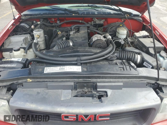 2002 GMC Sonoma SL z VIN 1GTCS145228246961, wystawiony jako Copart lot #55215355 z przebiegiem 146 068 mil mil oraz Tytuł czysty. Historia ofert i sprzedaży dostępna na DreamBid. Obrazek 11.