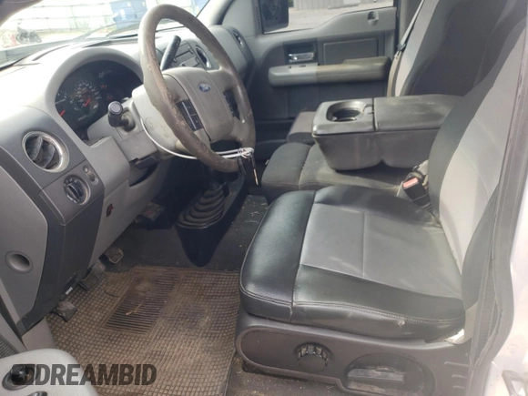 2007 Ford F-150 XL with VIN 1FTRF14V97KB65061, listed as a Copart auction lot 56280705 with 310,029 mi miles and Salvage title. Bid and sale history available at DreamBid. Image 7.