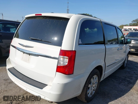 2012 Chrysler Town & Country Touring L with VIN 2C4RC1CGXCR163522, listed as a IAAI auction lot 41923296 with 218,342 mi miles and . Bid and sale history available at DreamBid. Image 4.