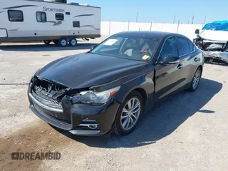 2014 Infiniti Q50 Premium z VIN JN1BV7AP2EM672661, wystawiony jako IAAI lot #42319325 z przebiegiem 85 803 mil mil oraz . Historia ofert i sprzedaży dostępna na DreamBid. Obrazek 2.