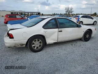 1994 Ford Thunderbird LX with VIN 1FALP62W6RH206764, listed as a Copart auction lot 44213965 with 105,353 mi miles and Salvage Title. Bid and sale history available at DreamBid. Image 3.