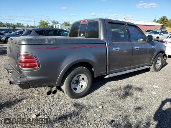 2002 Ford F-150 Harley Davidson with VIN 1FTRW07362KC77880, listed as a Copart auction lot 75259594 with 103,591 mi miles and Salvage Title. Bid and sale history available at carsss.com. Image 3.