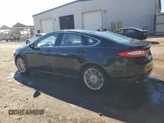 2014 Ford Fusion SE with VIN 3FA6P0H90ER323616, listed as a Copart auction lot 77161924 with 69,699 mi miles and Salvage Title. Bid and sale history available at carsss.com. Image 2.
