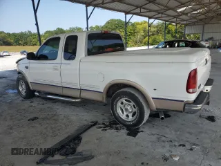 1998 Ford F-150 XL with VIN 1FTRX17L8WNA36541, listed as a Copart auction lot 70861344 with 266,137 mi miles and Salvage title. Bid and sale history available at DreamBid. Image 2.