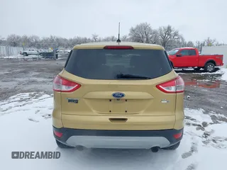 2014 Ford Escape SE with VIN 1FMCU9GX4EUE01300, listed as a IAAI auction lot 41674134 with 136,192 mi miles. Bid and sale history available at carsss.com. Image 16.