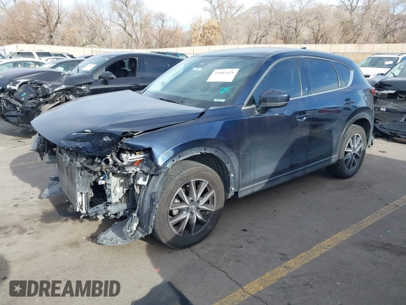 2017 Mazda CX-5 Grand Touring with VIN JM3KFBDL3H0149397, listed as a IAAI auction lot 41085425 with 161,675 mi miles. Bid and sale history available at carsss.com. Image 17.