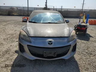 2012 Mazda 3 i Touring with VIN JM1BL1V86C1557191, listed as a Copart auction lot 63002985 with 218,863 mi miles and Clean title. Bid and sale history available at DreamBid. Image 5.