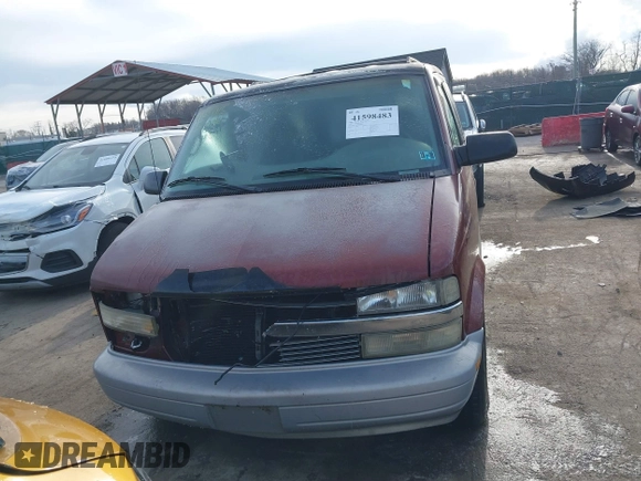 1999 Chevrolet Astro with VIN 1GNEL19W5XB102247, listed as a IAAI auction lot 41598483 with 184,041 mi miles. Bid and sale history available at carsss.com. Image 12.