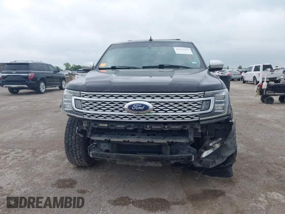 2019 Ford Expedition Platinum with VIN 1FMJU1LT3KEA23522, listed as a IAAI auction lot 42149429 with 113,766 mi miles and . Bid and sale history available at DreamBid. Image 6.